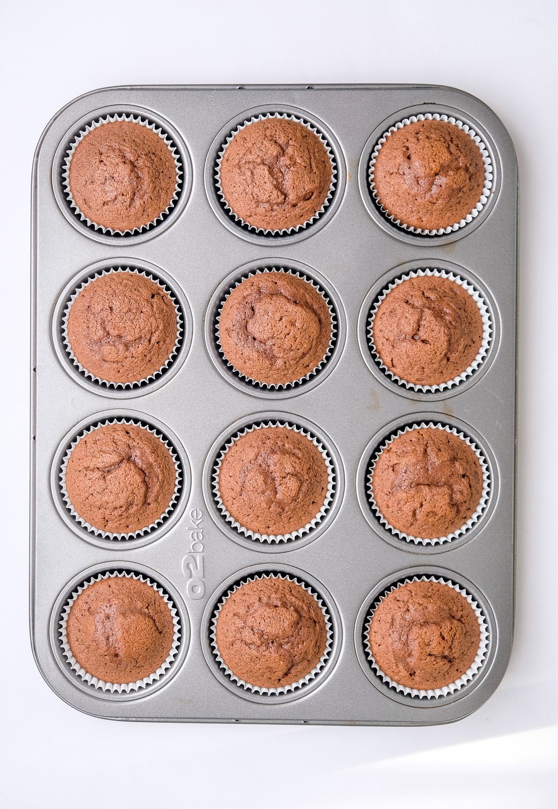 Image showing step 6 of how to make the chocolate cupcakes.