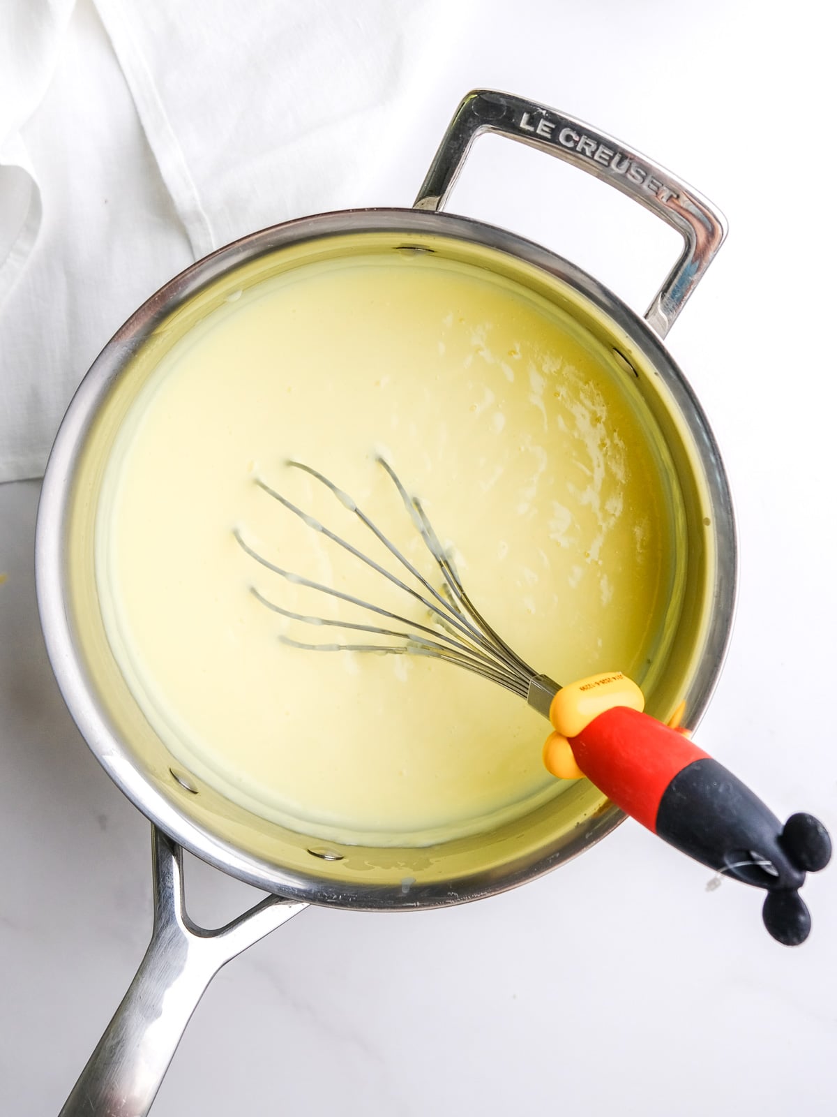 Image shows step 4 of how to make the custard filling.