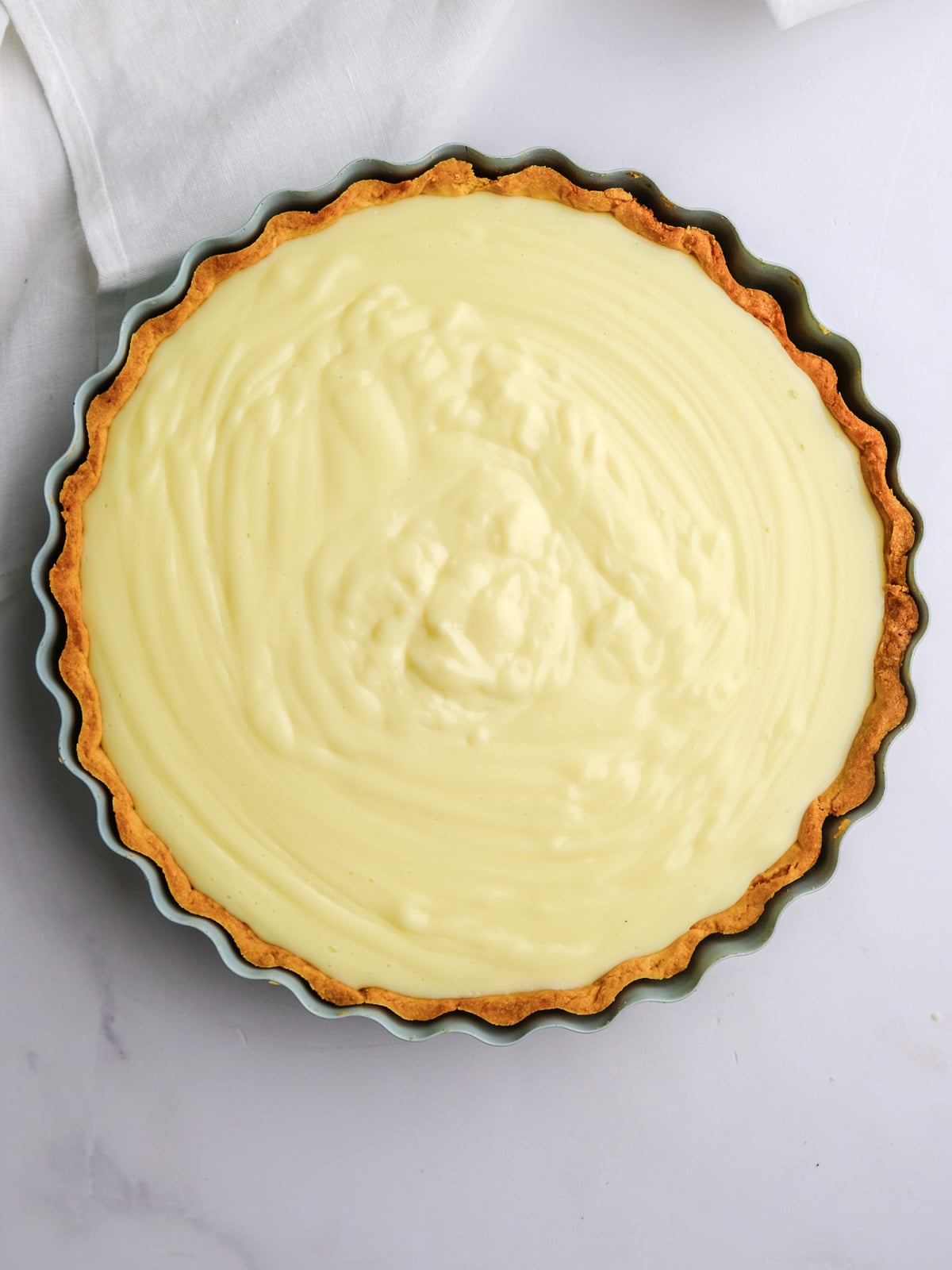 Image shows step 5 of how to make the custard filling.