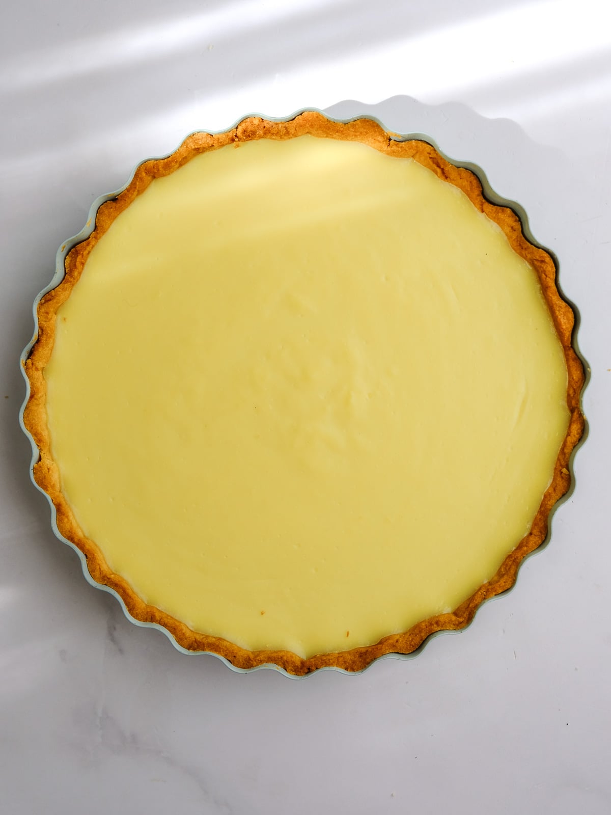 Image shows step 6 of how to make the custard filling.