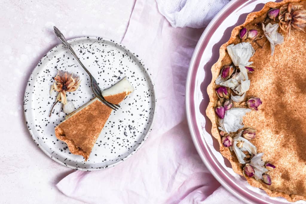Classic Milktart Recipe - slice show next to the whole tart 