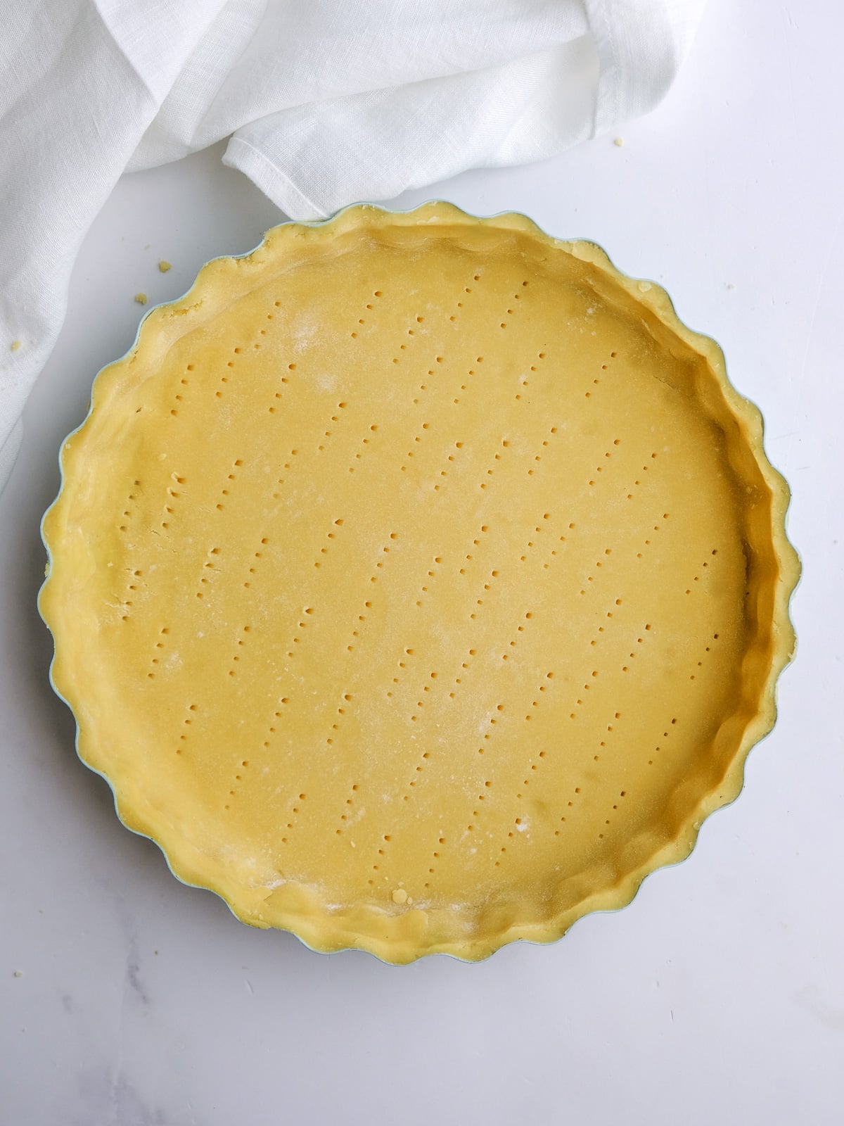 Image shows step 5 of how to make the shortcrust pastry.