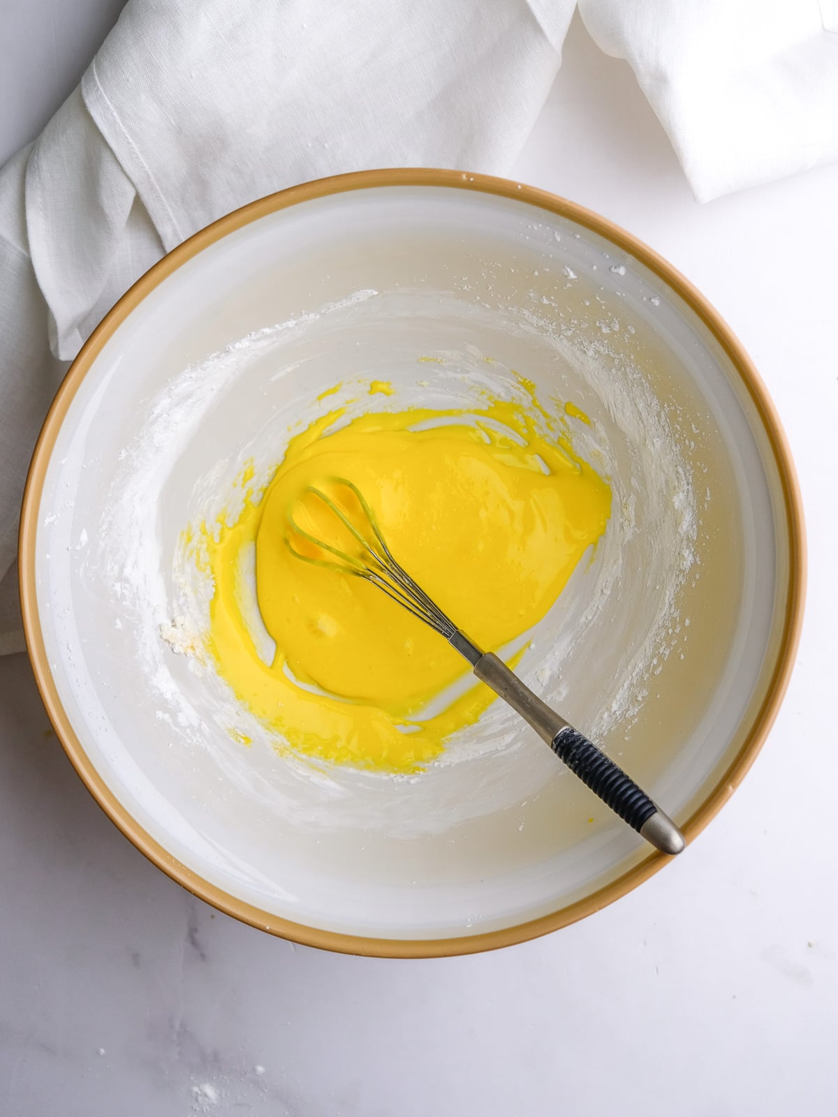 Image shows step 2 of how to make the custard filling.