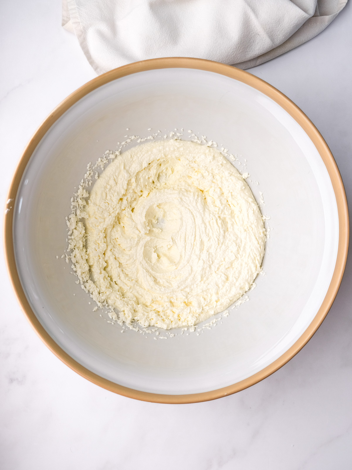 Image shows step 1 of how to make a moist chocolate cake.