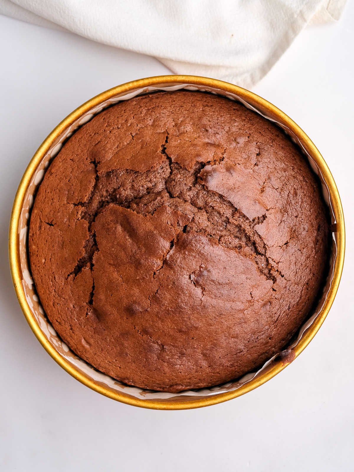 Image shows step 6 of how to make a moist chocolate cake.