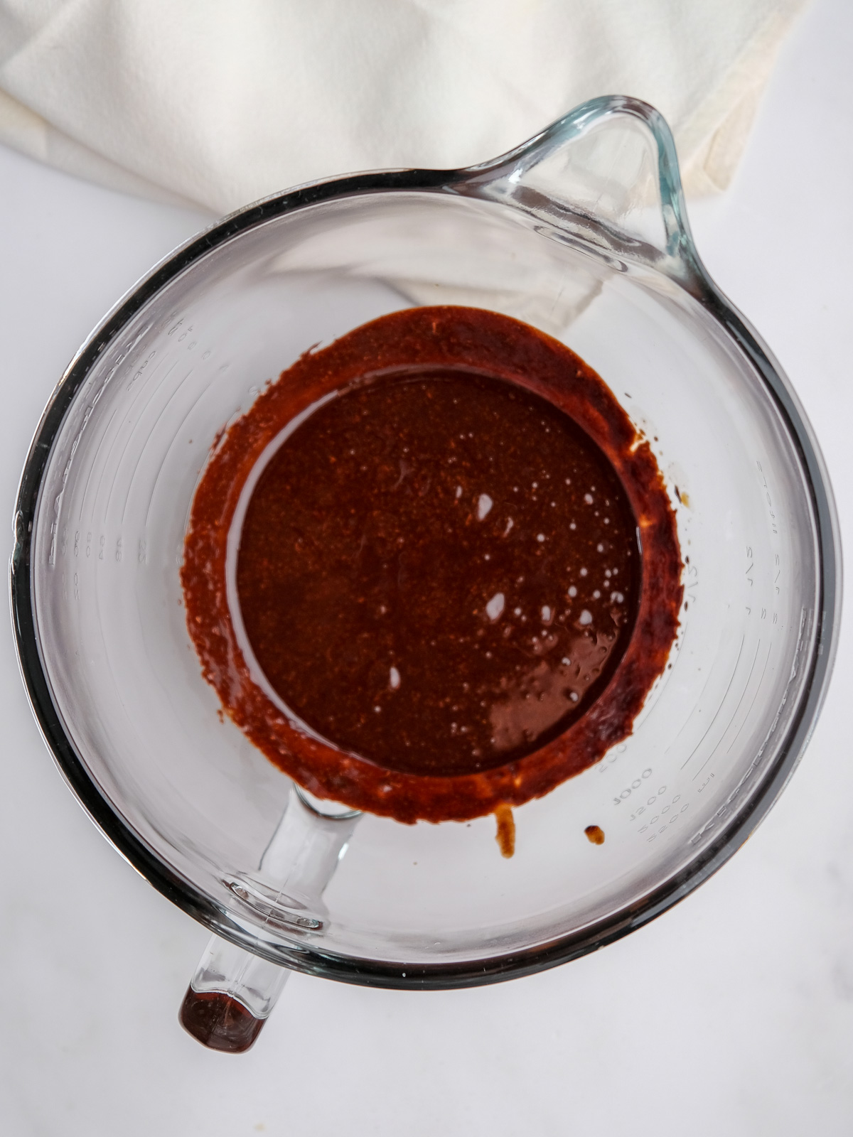 Image shows step 1 of how to make a chocolate buttercream.