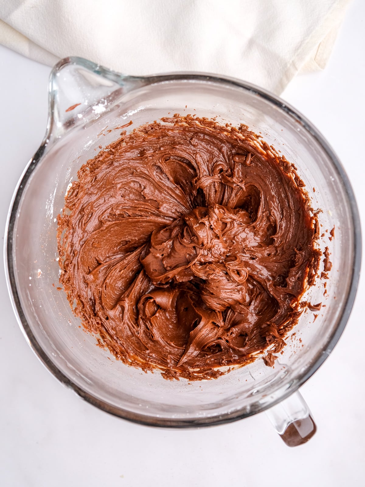 Image shows step 3 of how to make a chocolate buttercream.