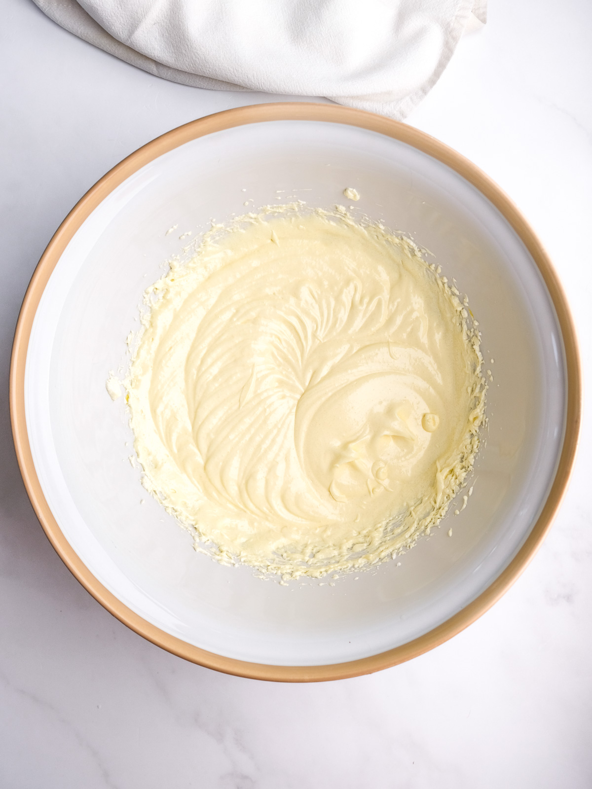 Image shows step 2 of how to make a moist chocolate cake.