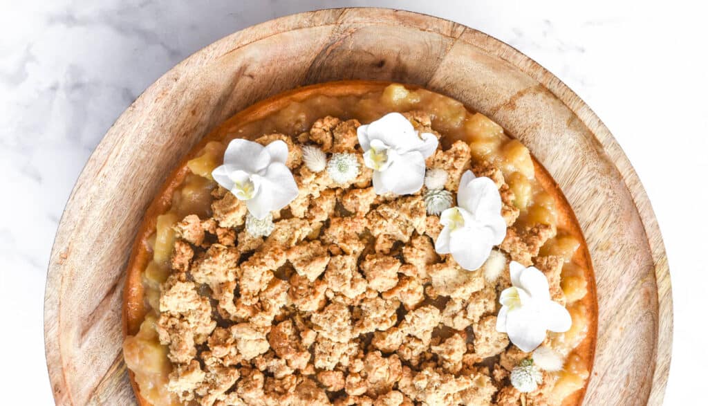 Apple Crumble Cheesecake shown from above
