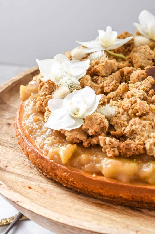 Apple Crumble Cheesecake shown close up 
