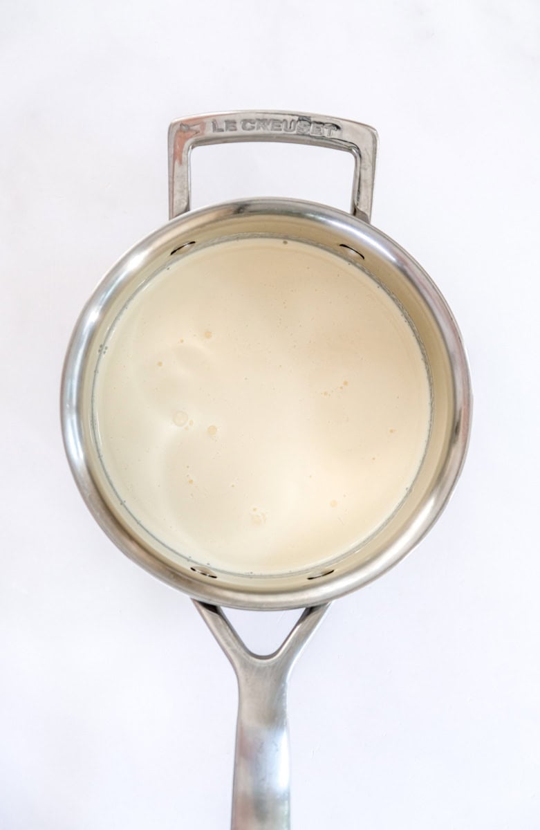 Image showing step 2 of how to make a white chocolate creme brulee.