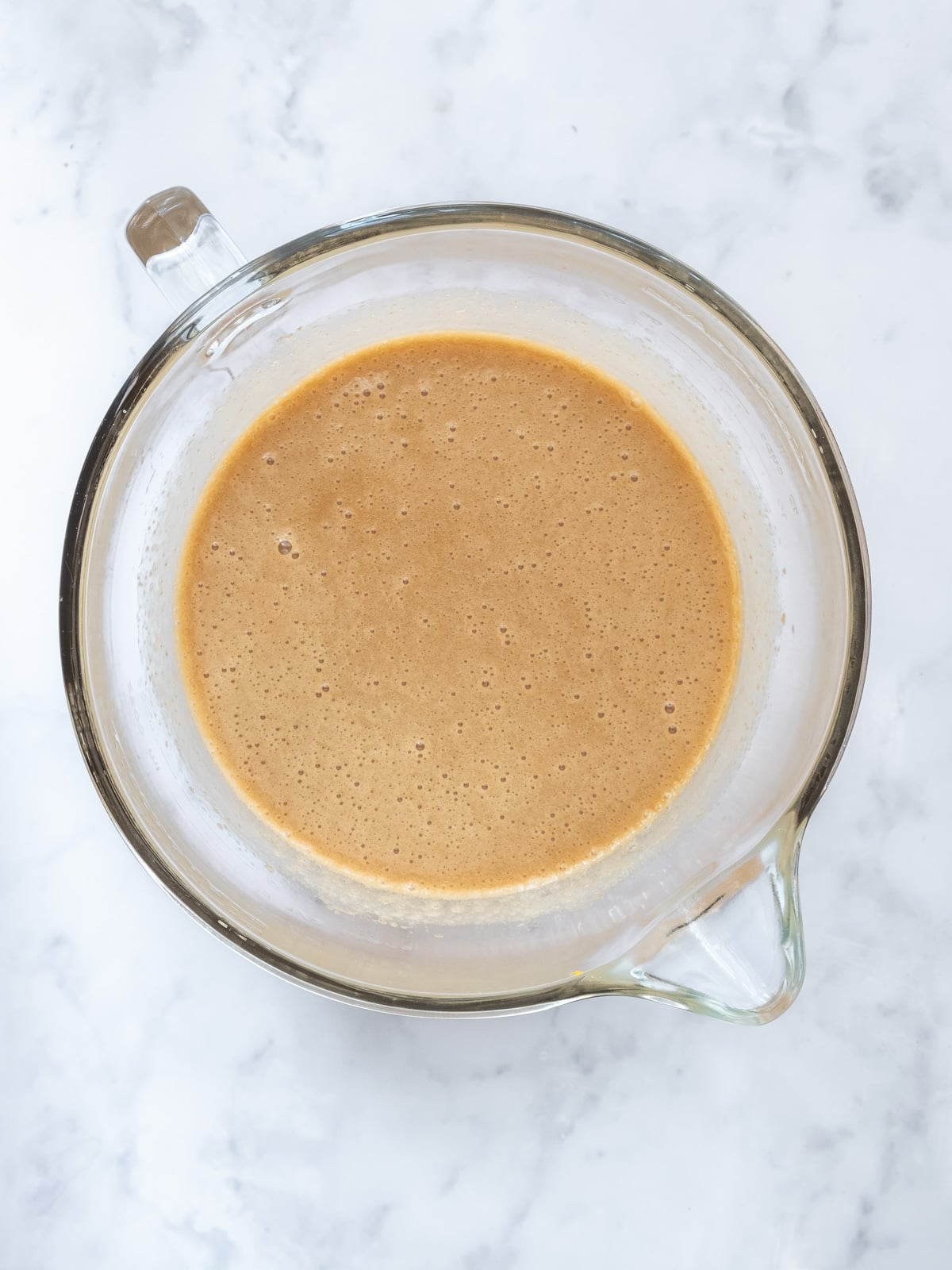 Image shows step 1 of how to make mini carrot loaf cakes.