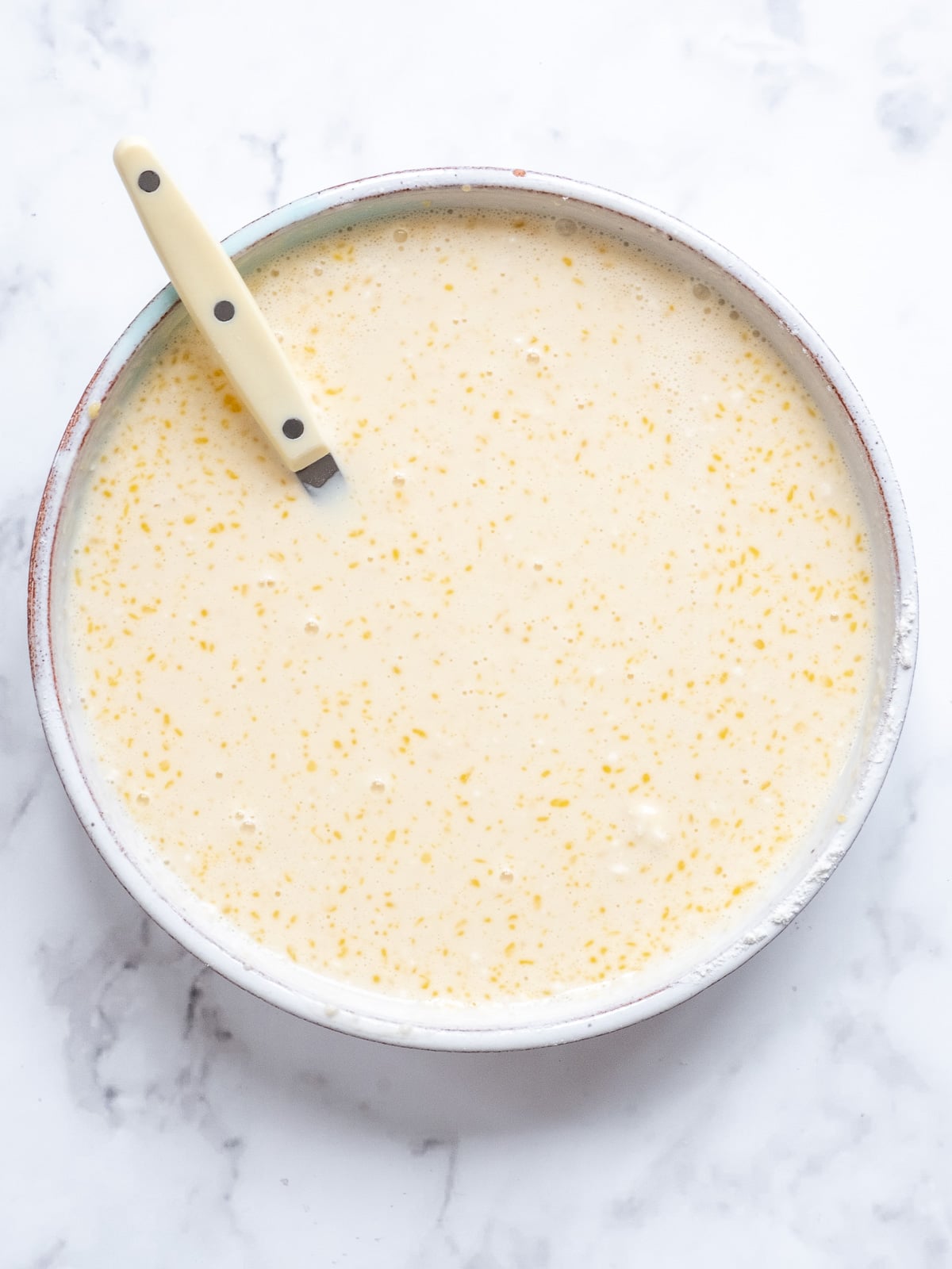 Image shows step 2 of how to make South African pancakes.