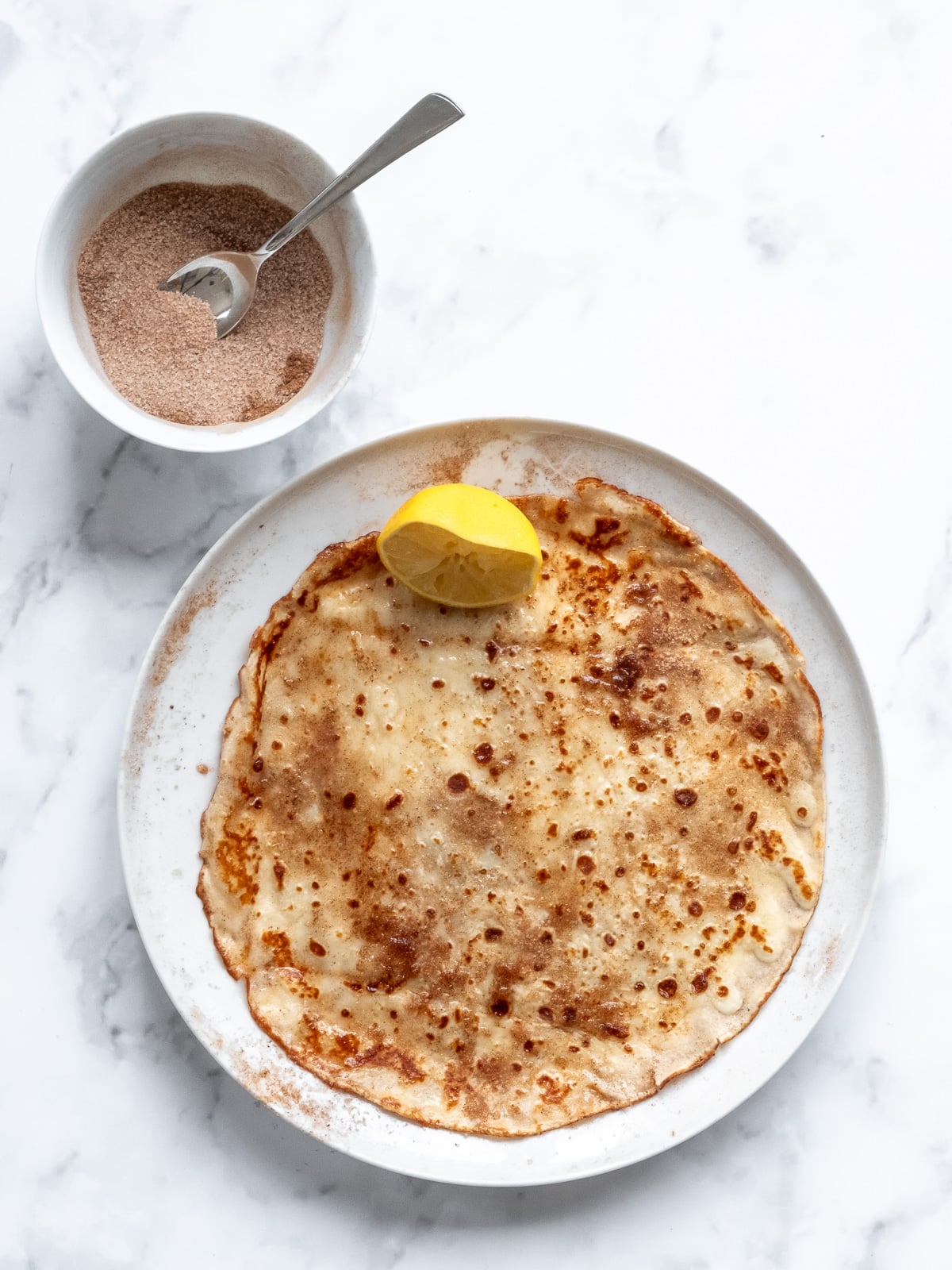 Image shows step 4 of how to make South African pancakes.