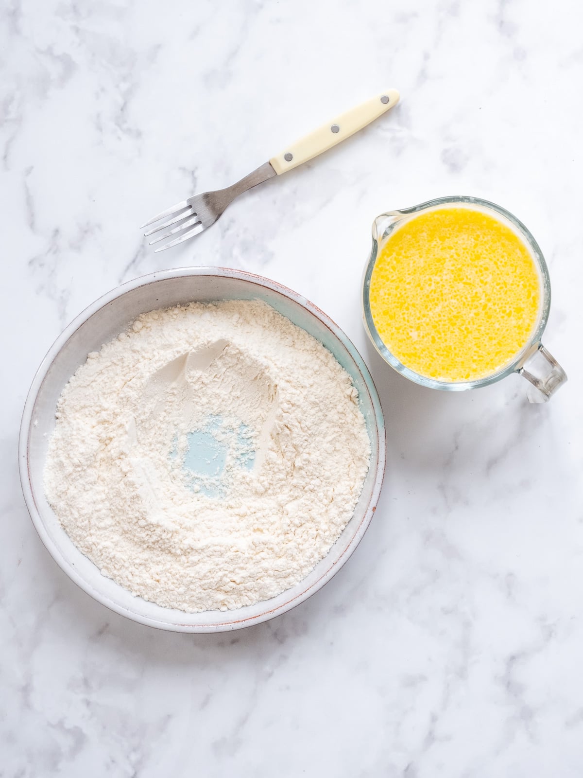 Image shows step 1 of how to make South African pancakes.