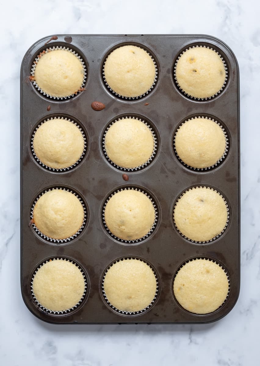 Passionfruit Cupcakes in a cupcake pan without frosting 
