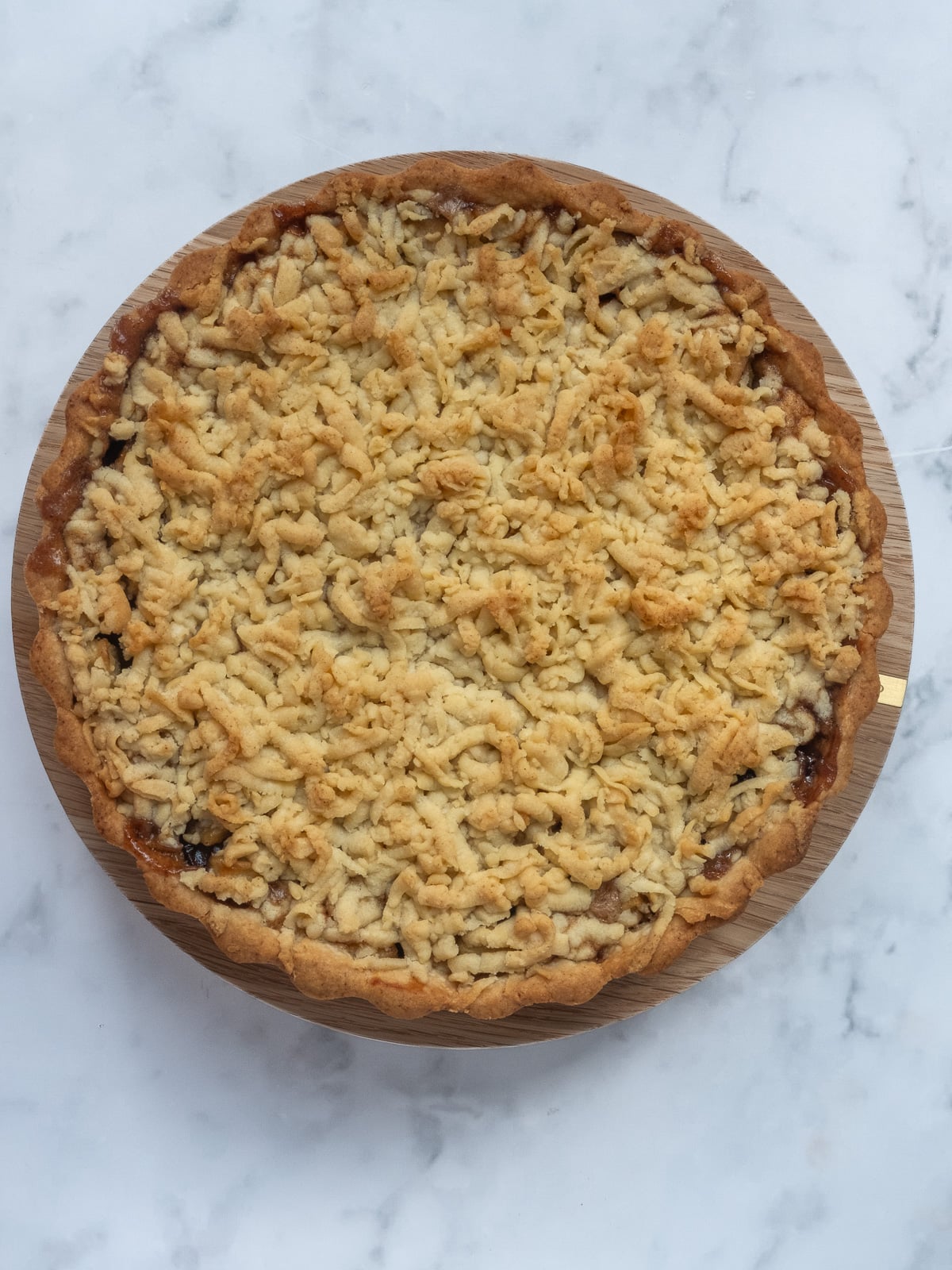 Image shows step 6 of how to make the cranberry and apple tart filling.