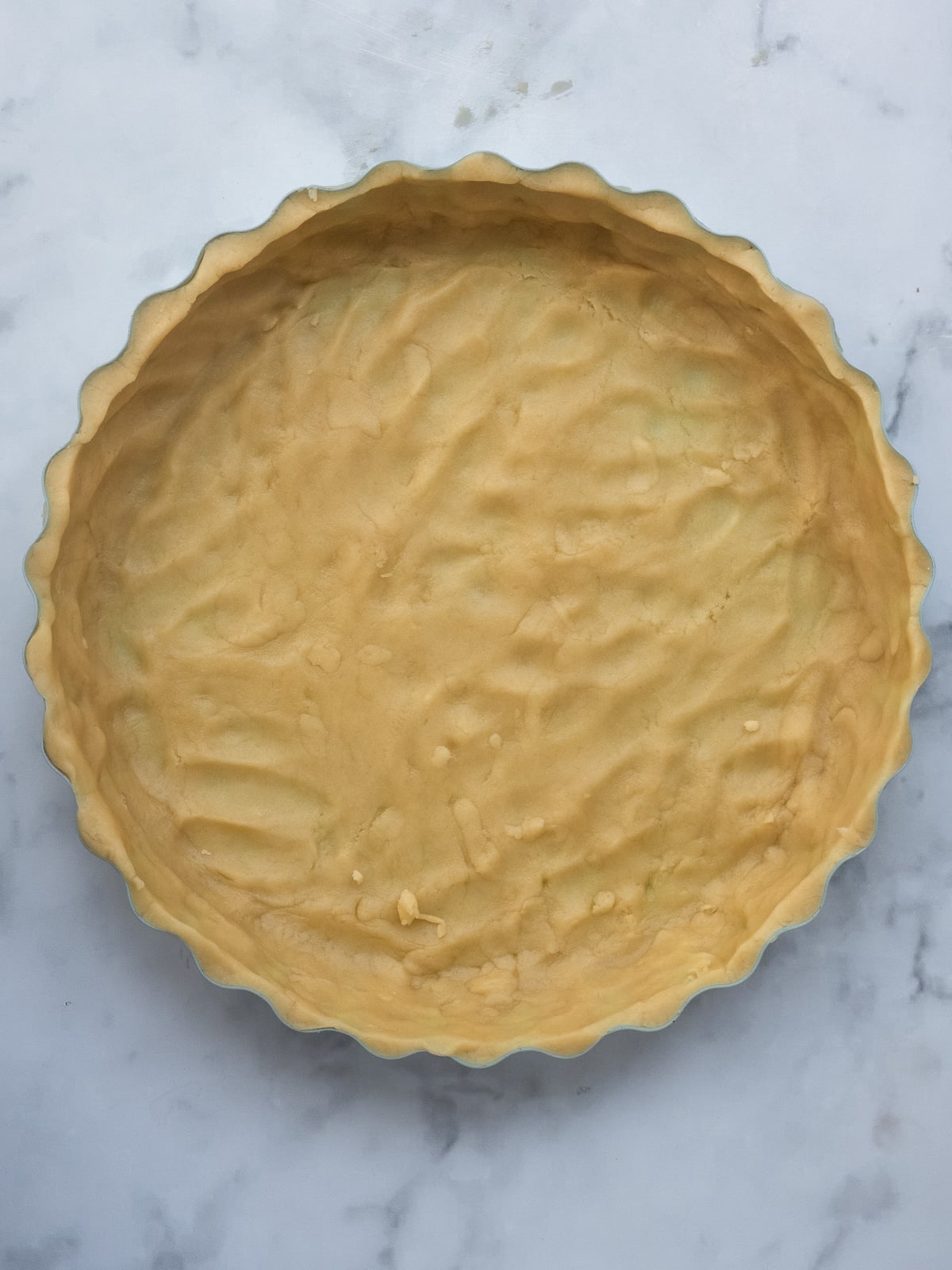 Image shows step 4 of how to make the cranberry and apple tart filling.