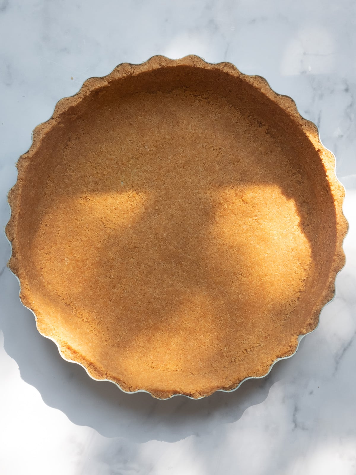 Image shows unfilled biscuit base.