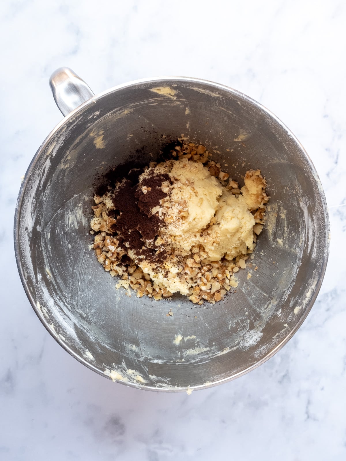 Image shows step 3 of how to make the walnut and espresso cookies.