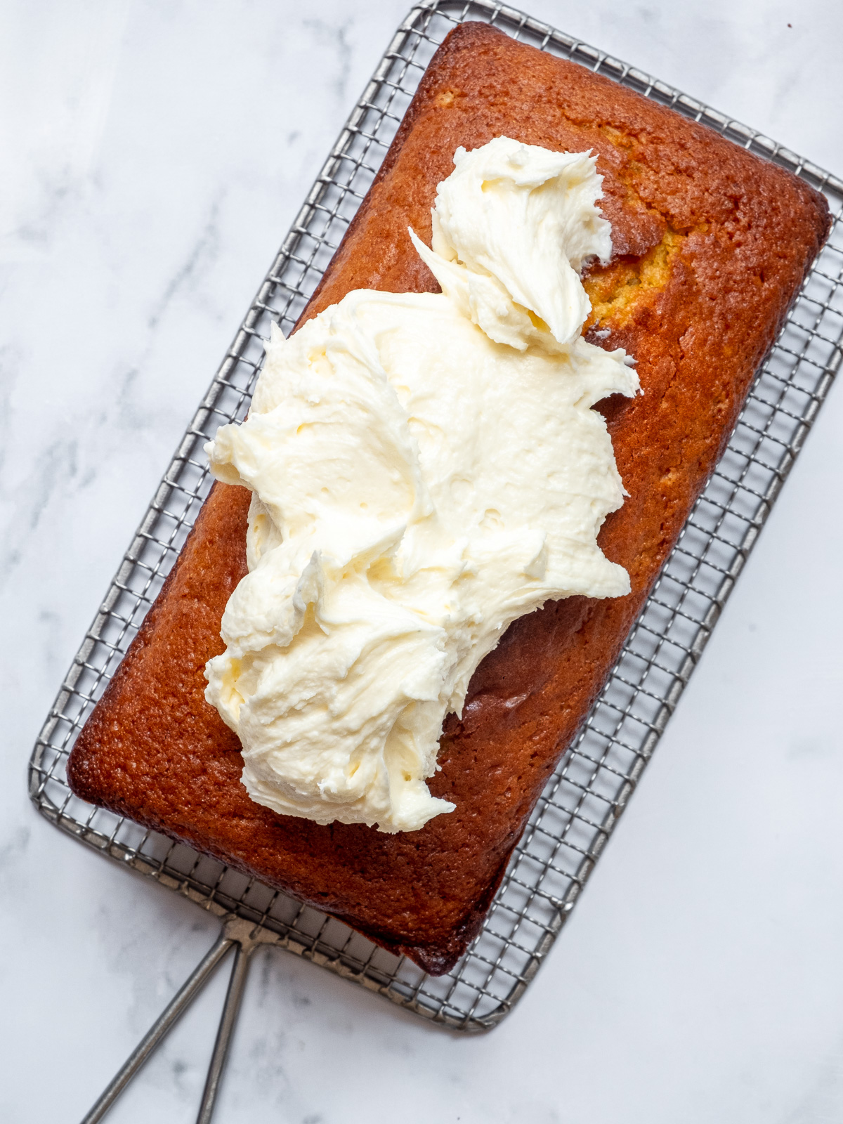 Image shows step 2 of how to make this cream cheese frosting for pumpkin bread.