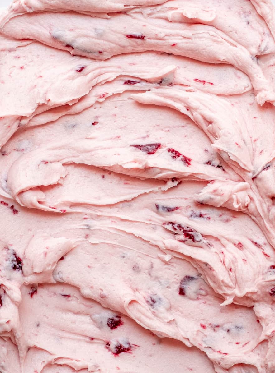 Cherry Frosting shown up close, swirled on a plate.