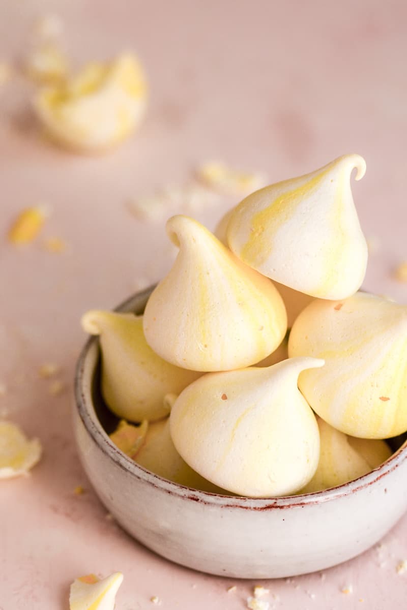 Lemon Meringues in a small bowl on a counter top.
