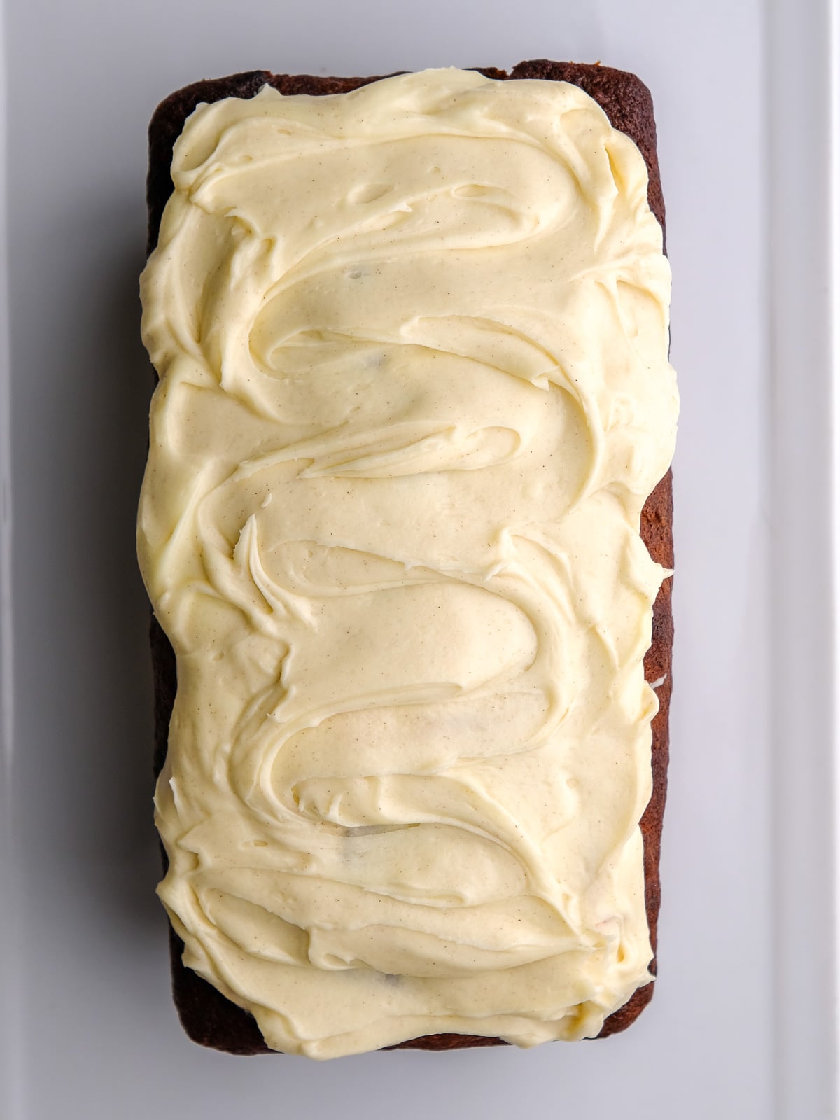 Image shows step 4 of how to make the cream cheese frosting.