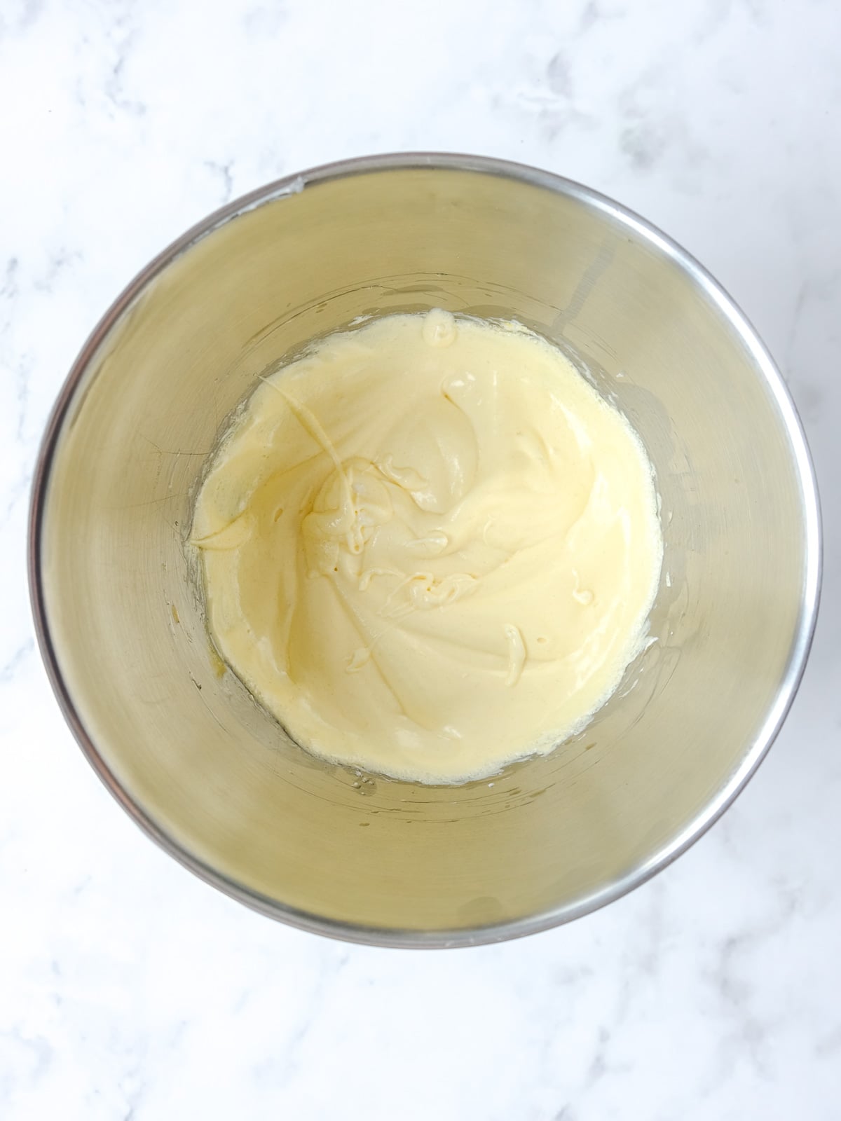 Image shows step 2 of how to make the moist chocolate cake.