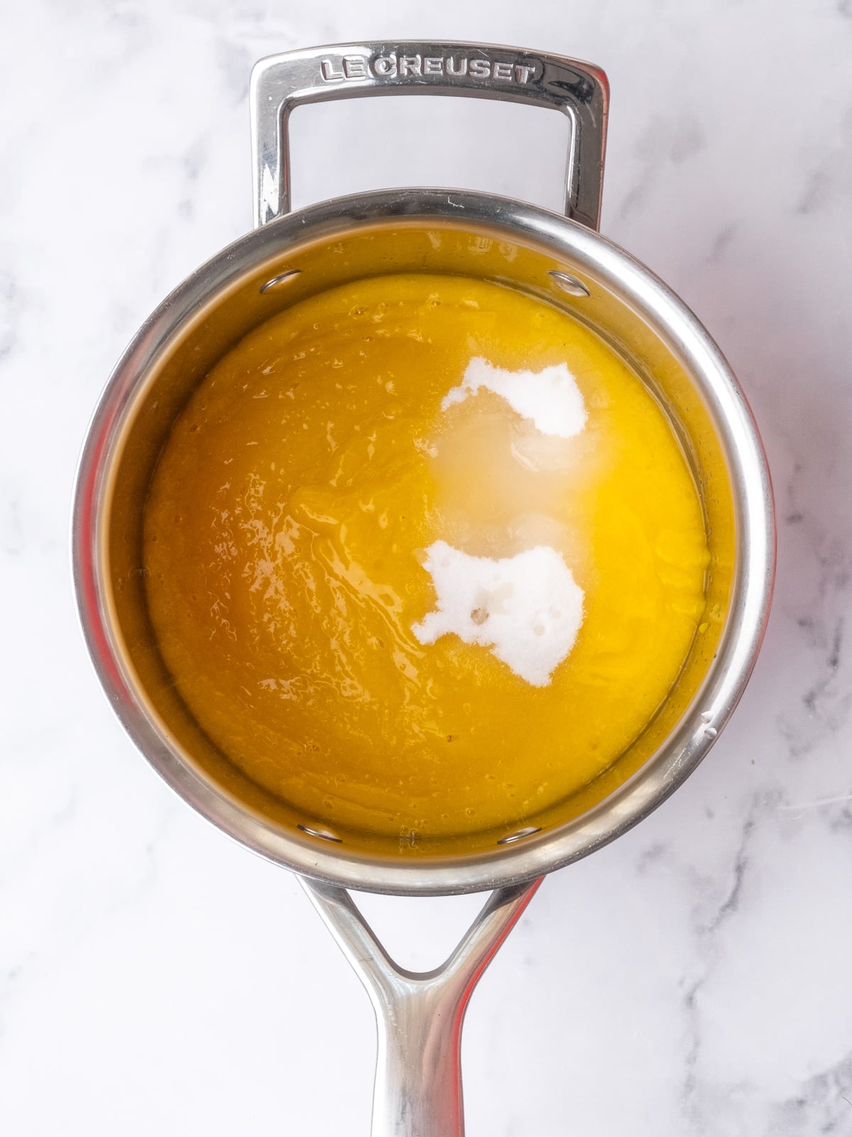 Image shows step 1 of how to make cheesecake Easter eggs.