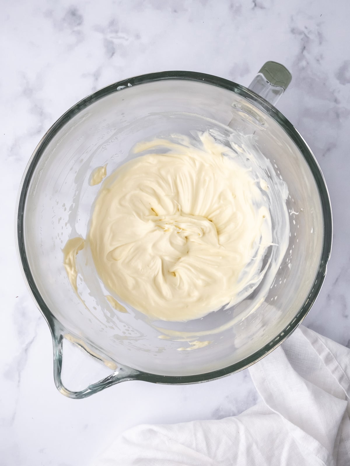 Image shows step 4 of how to make cheesecake Easter eggs.