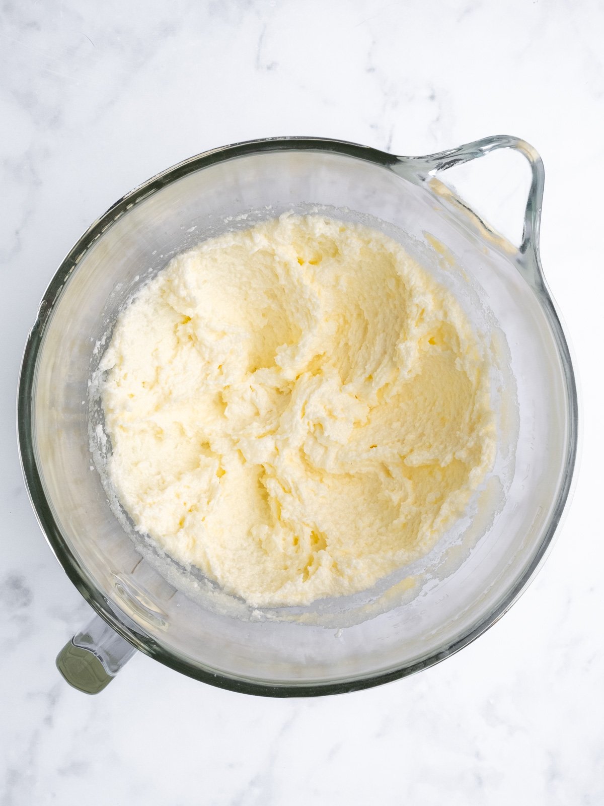 Image shows step 1 of how to make a vanilla tray bake.