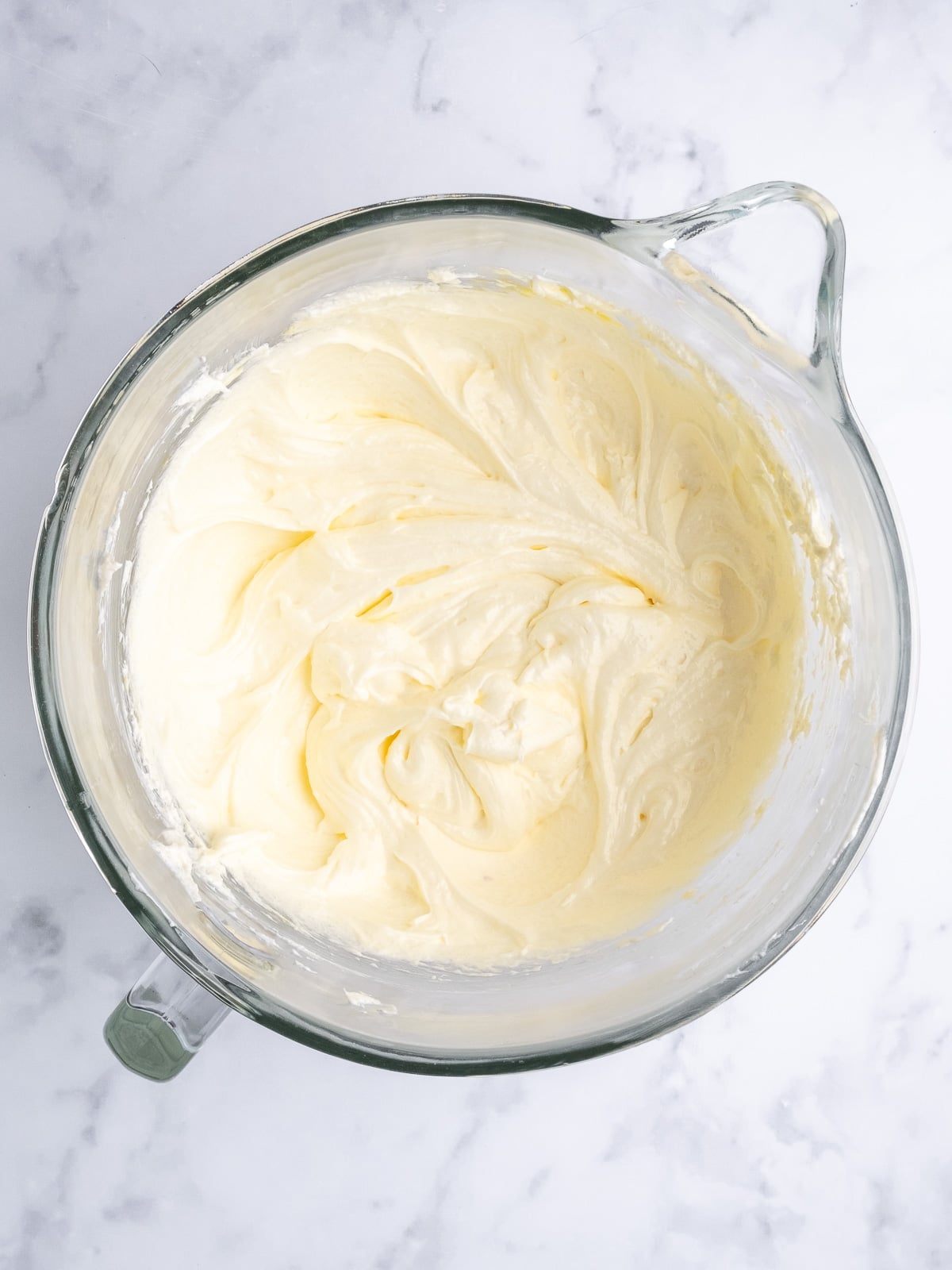 Image shows step 2 of how to make a vanilla tray bake.