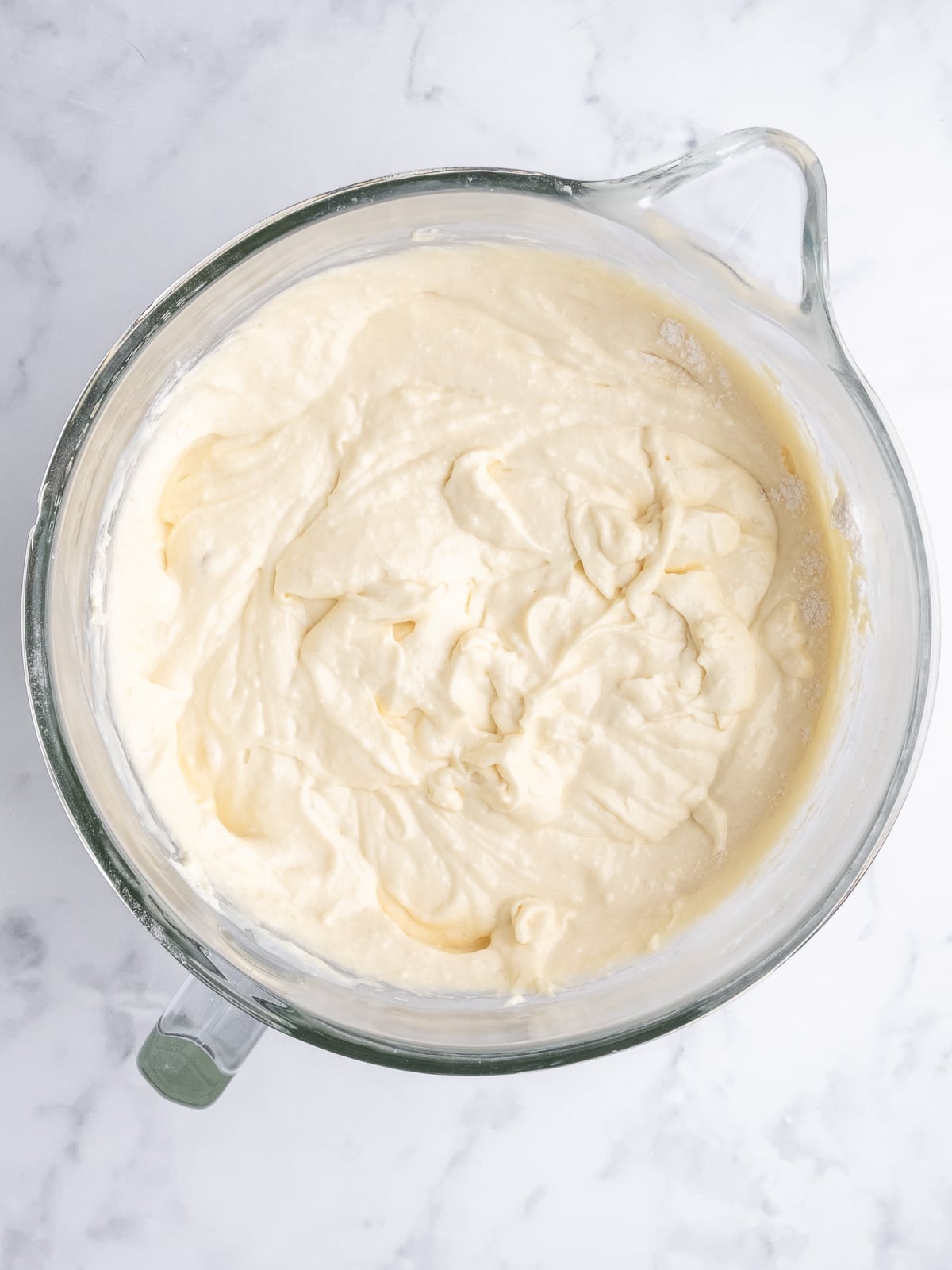 Image shows step 3 of how to make a vanilla tray bake.