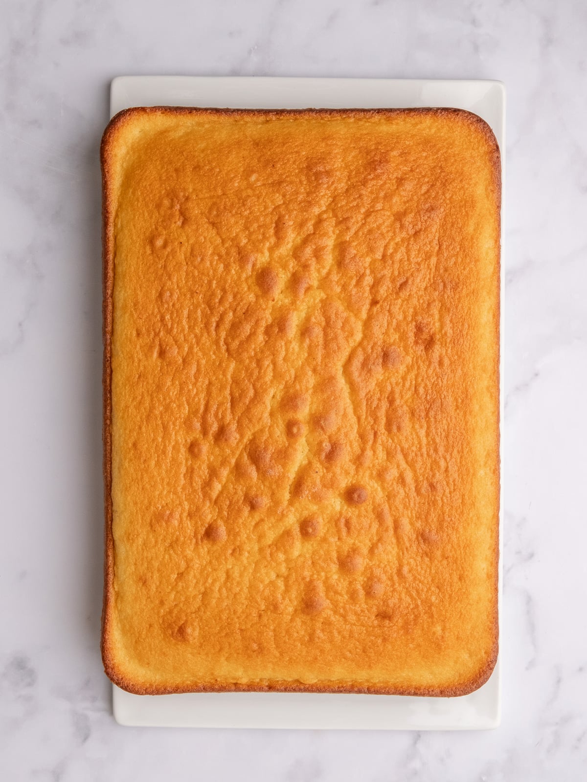 Image shows step 3 of how to make a vanilla buttercream frosting.