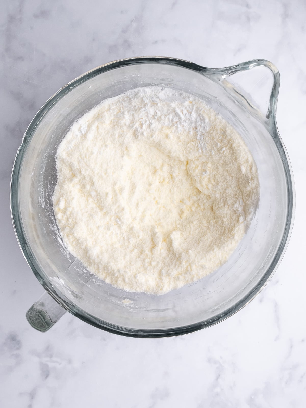 Image shows step 1 of how to make buttercream for rose cookies.