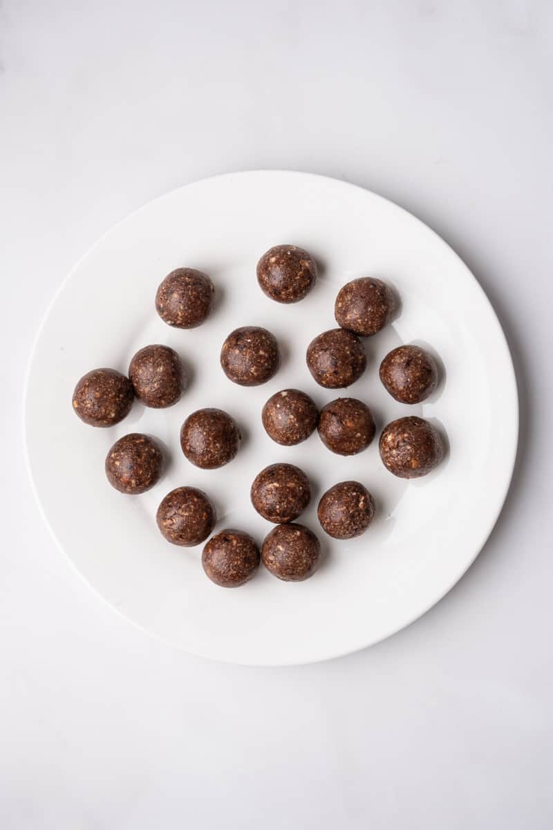 Image shows step 4 of how to make chocolate condensed milk truffles.
