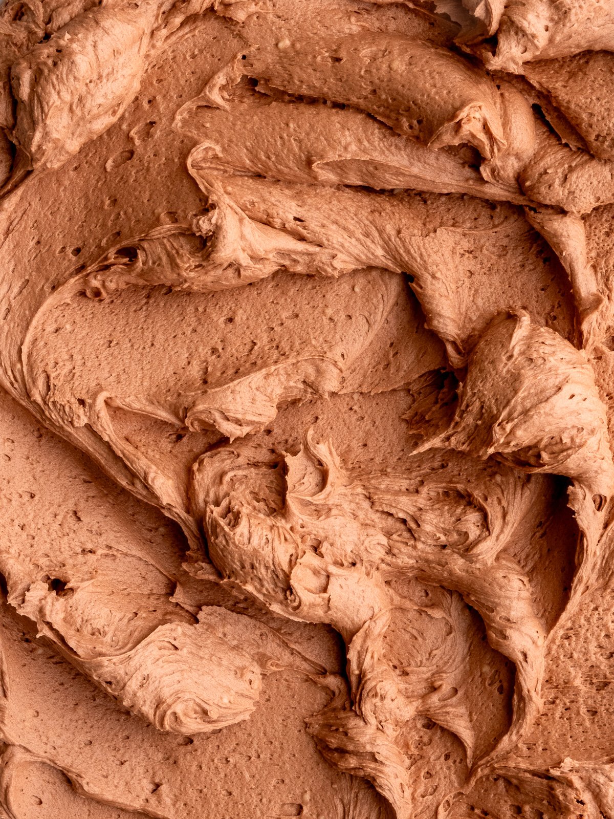 Image shows step 4 of how to make Nutella buttercream.