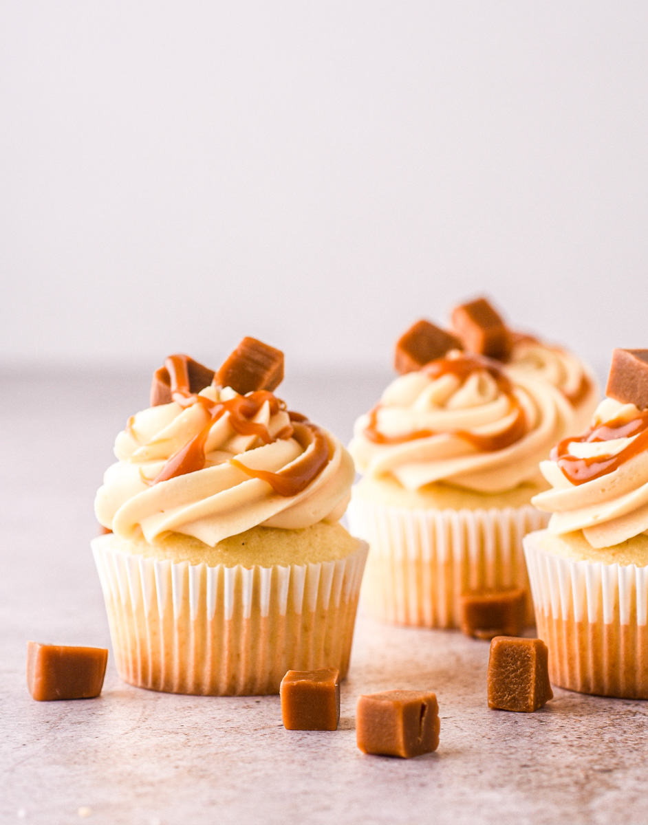 Caramel Filled Cupcakes on a kitchen counter.