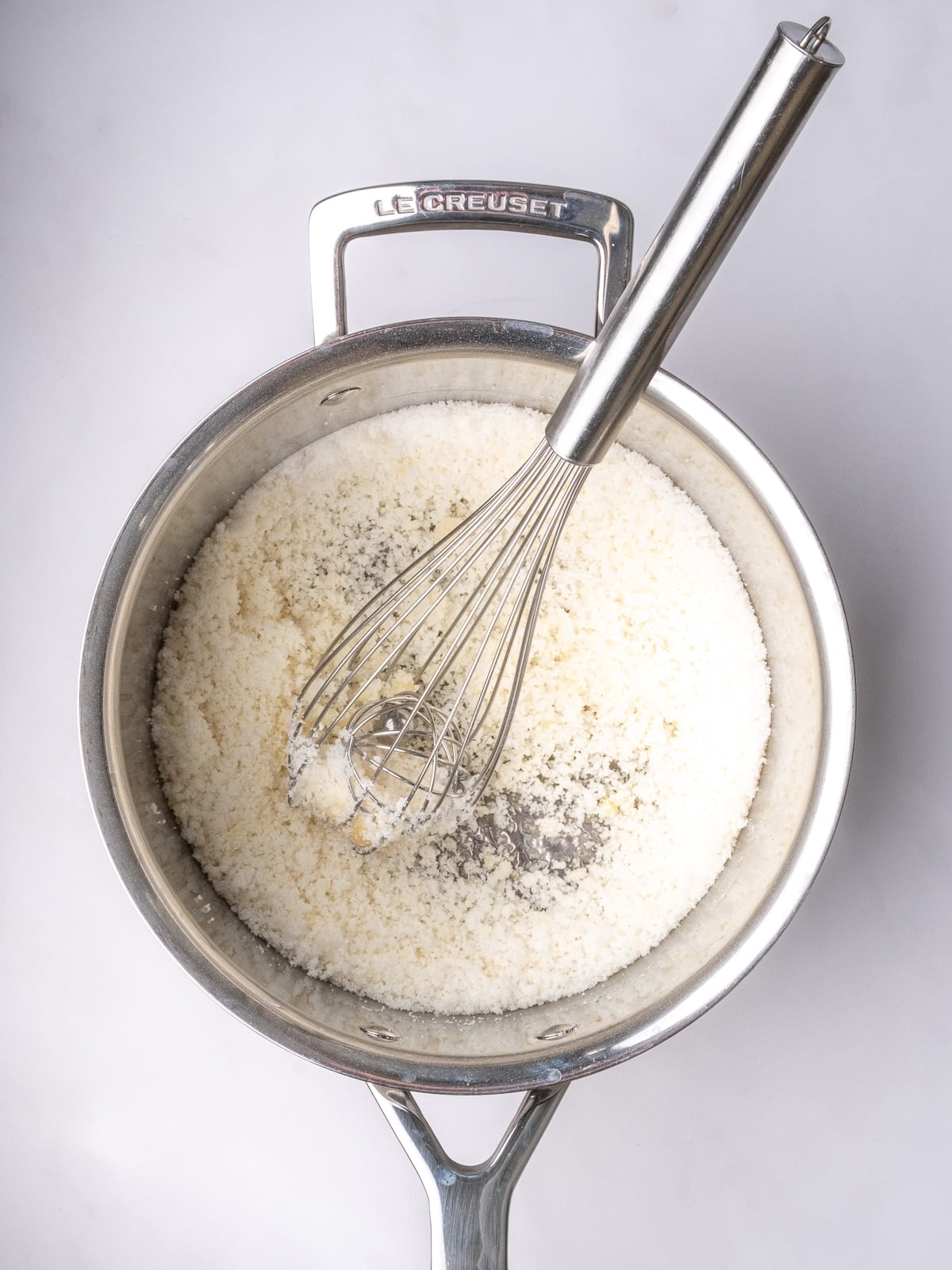 Image shows step 1 of how to make the salted caramel sauce for apple crumble tarts.