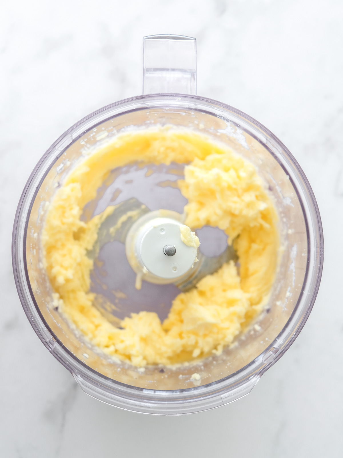 Image shows step 1 of how to make the pastry for apple crumble tarts.