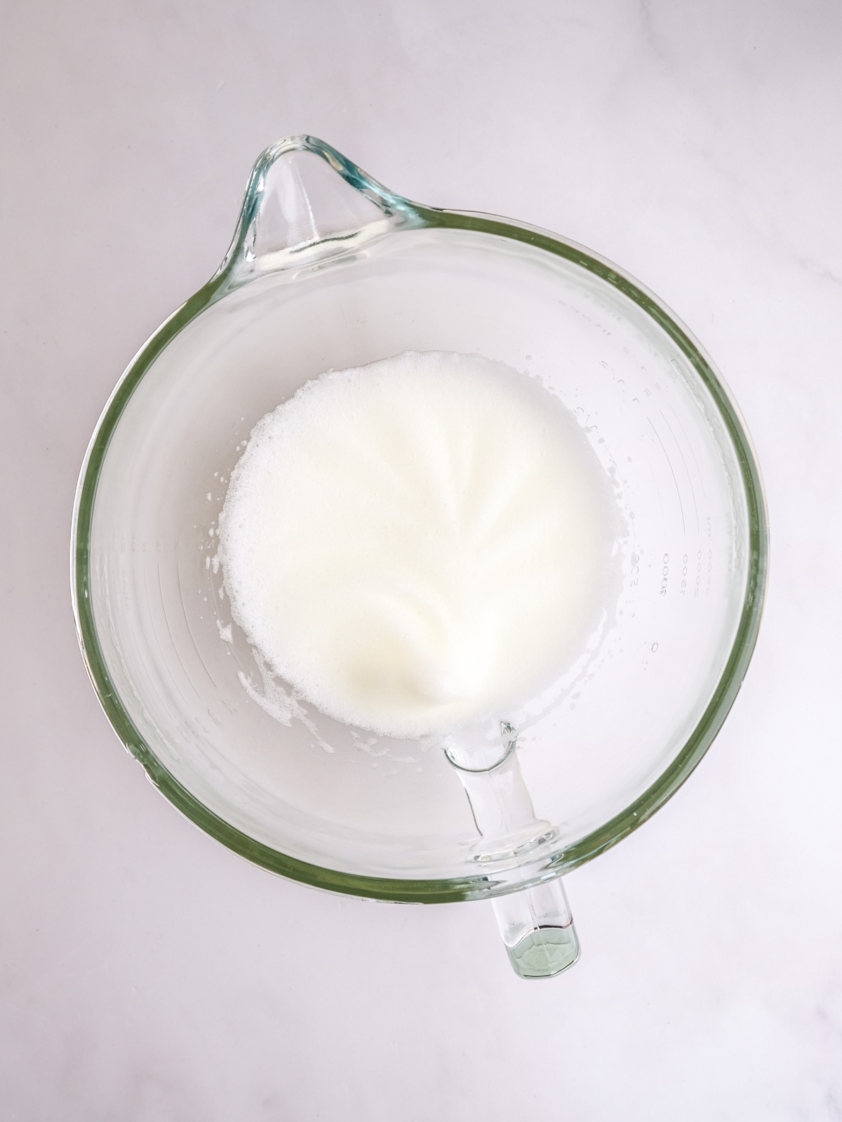 Image shows step 2 of how to make ghost meringues.