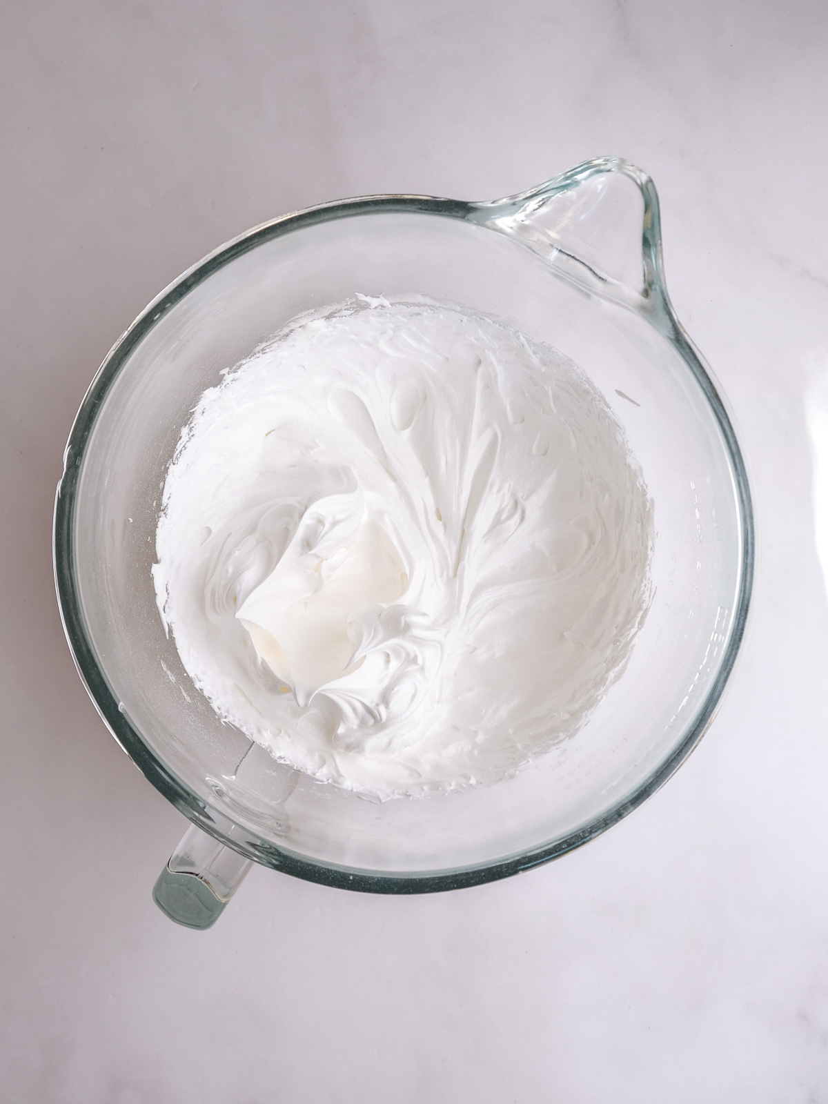 Image shows step 3 of how to make ghost meringues.