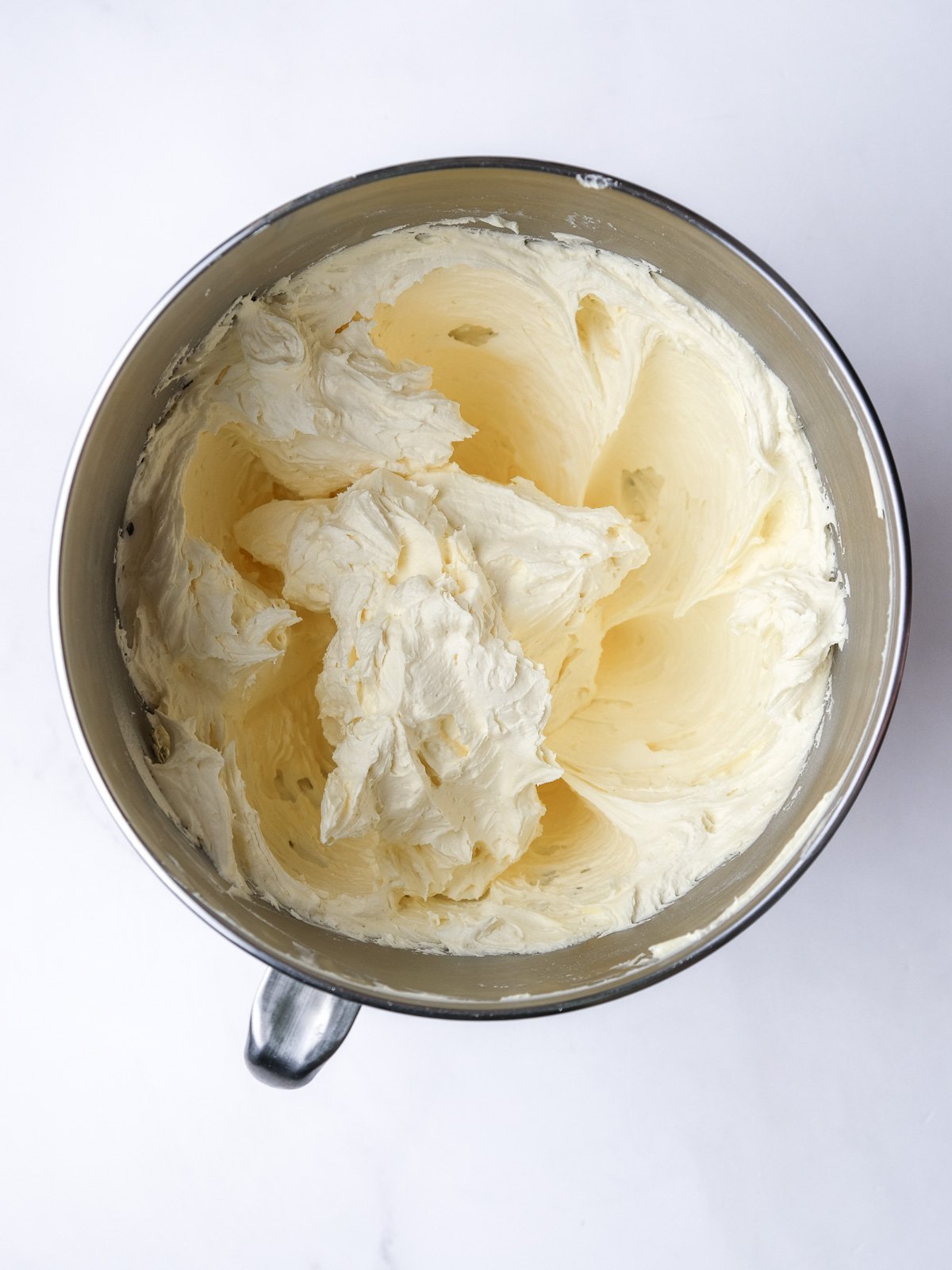 Image shows step 2 of how to make the vanilla bean buttercream.