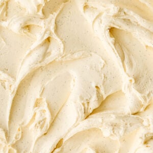 Image shows vanilla bean buttercream spread over a flat surface, you can see the flecks of vanilla.