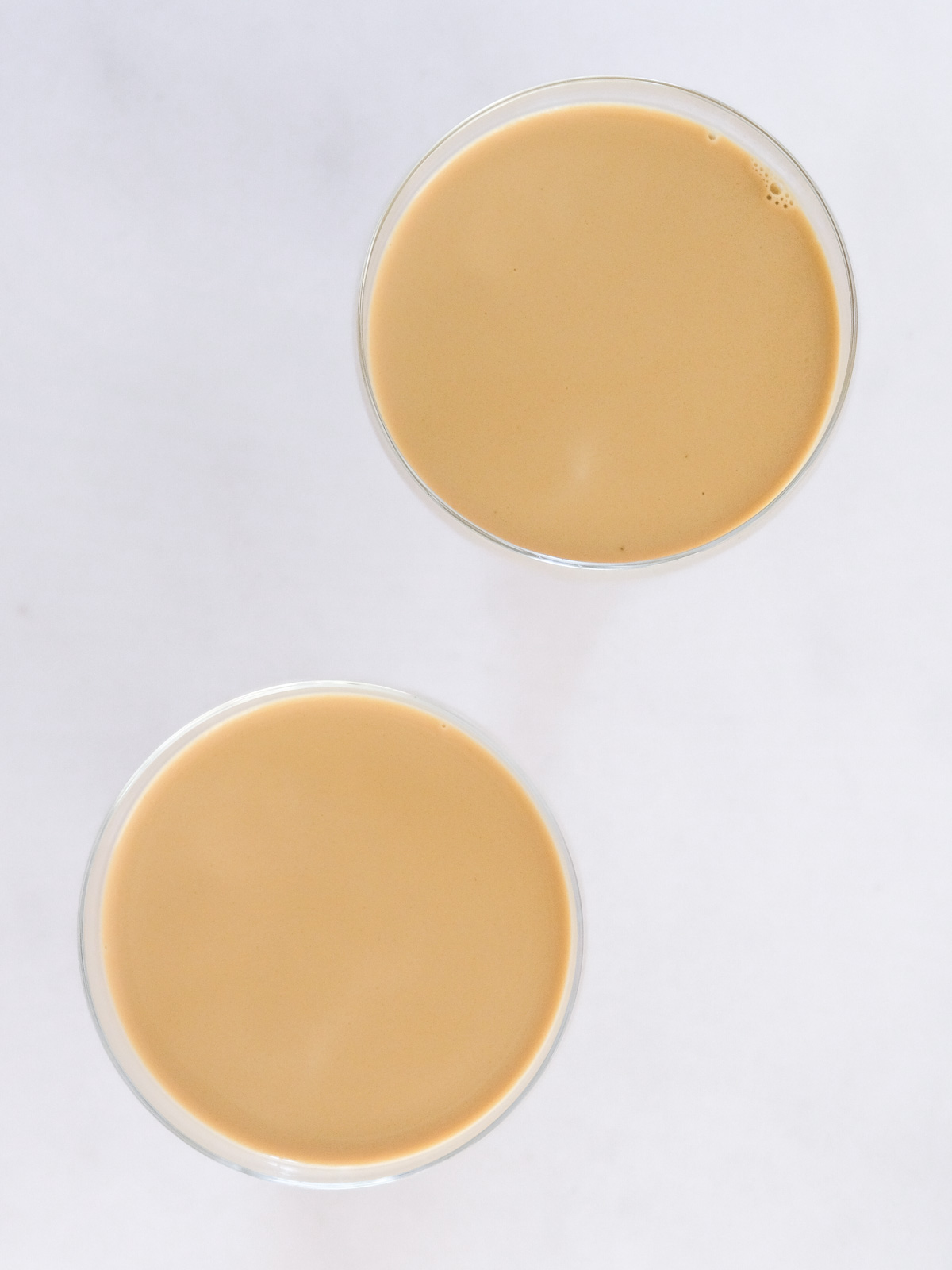Image shows step 4 of how to make espresso panna cottas.