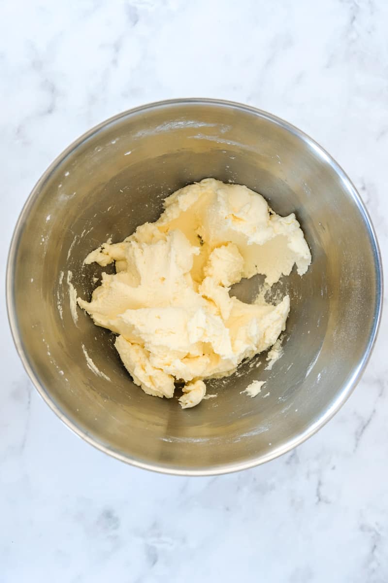 Image shows step 1 of how to make the passionfruit buttercream.