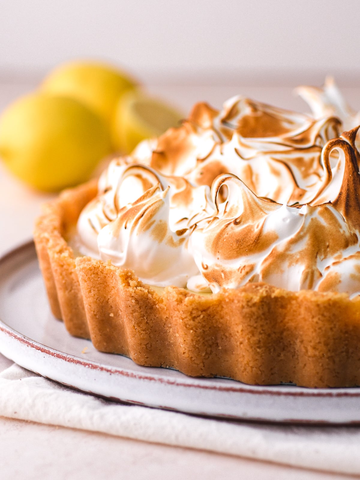 Image shows step 4 of how to make the meringue topping for a lemon meringue pie.