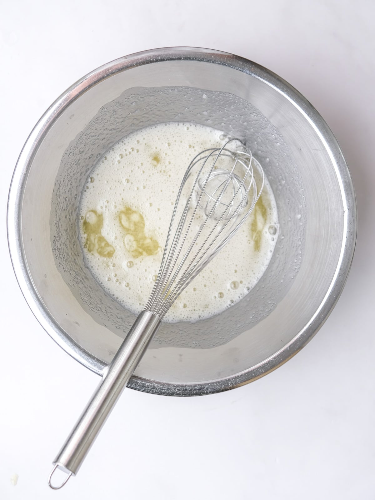 Image shows step 1 of how to make the meringue topping for a lemon meringue pie.