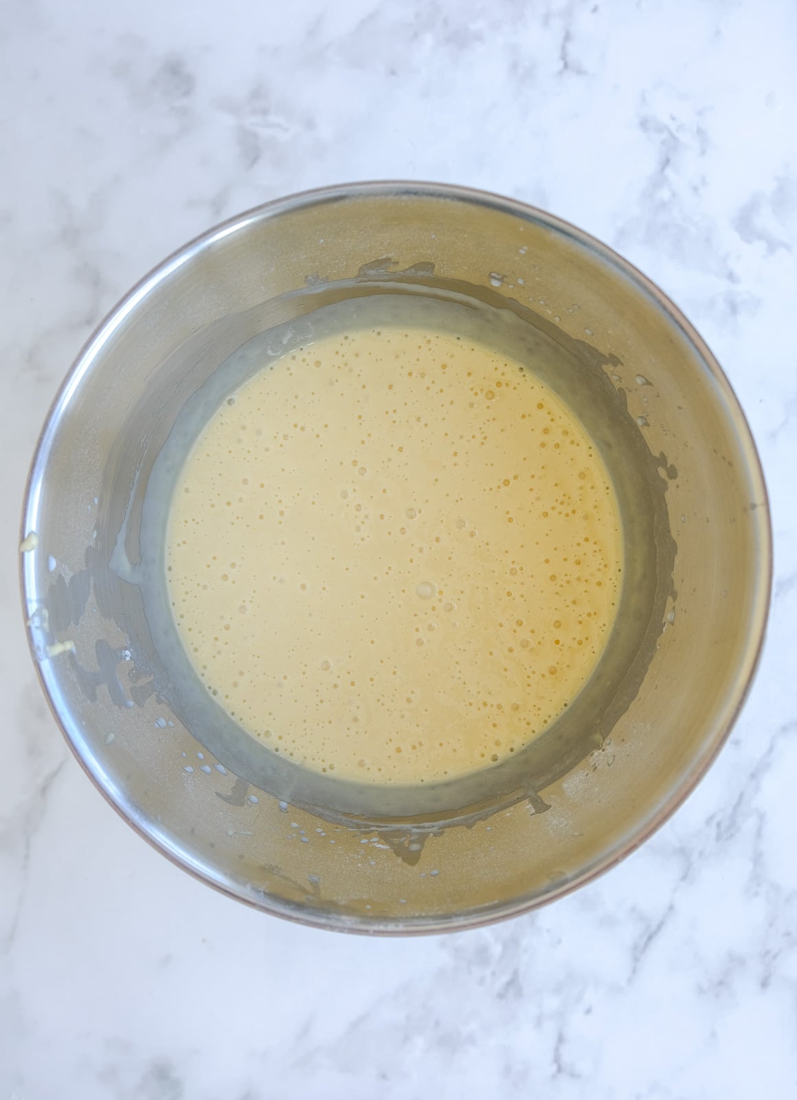 Image shows step 3 of how to make the vanilla cupcakes.